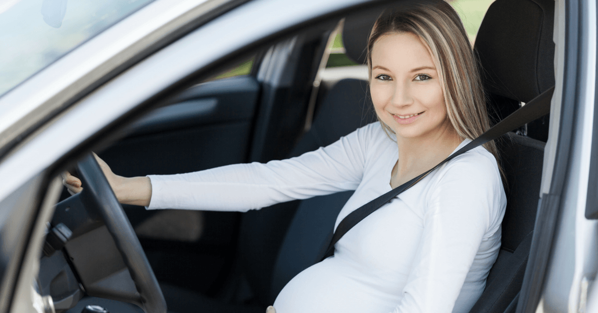 How should I wear my seat belt when pregnant?