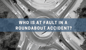 Who is at fault in a roundabout accident?