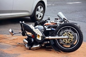 Who pays for motorcycle damage after motorcycle car accident