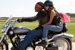 couple on motorcycle without helmets