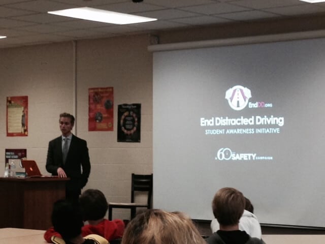 Attorney Brandon Hewitt speaks on distracted driving at the Byron Center in Grand Rapids