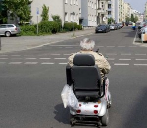 Man in motorized wheelchair