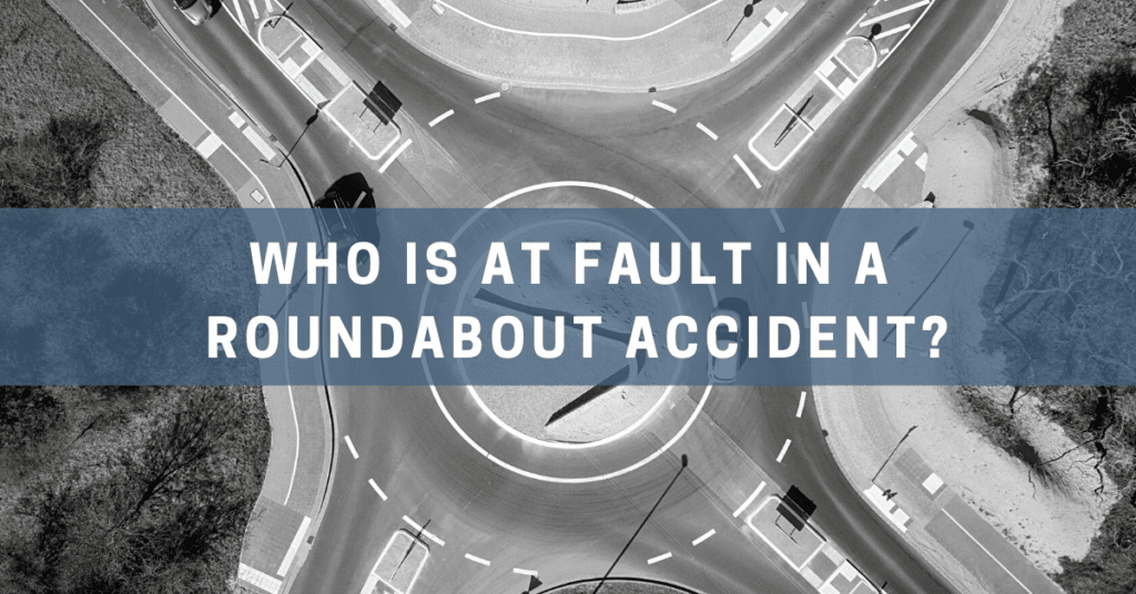 Who is at fault in a roundabout accident?