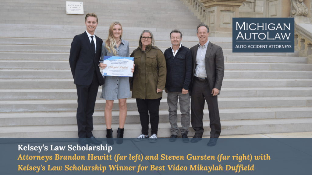 Brandon Hewitt, attorney and COO of Michigan Auto Law (far left) and Steve Gursten, attorney and President of Michigan Auto Law (far right), with Kelsey’s Law Scholarship Winner for Best Video Mikaylah Duffield. Bonnie Raffaele, mother of Kelsey Raffaele in whose honor the scholarship was created, is middle and to her right is her husband Ron Raffaele.