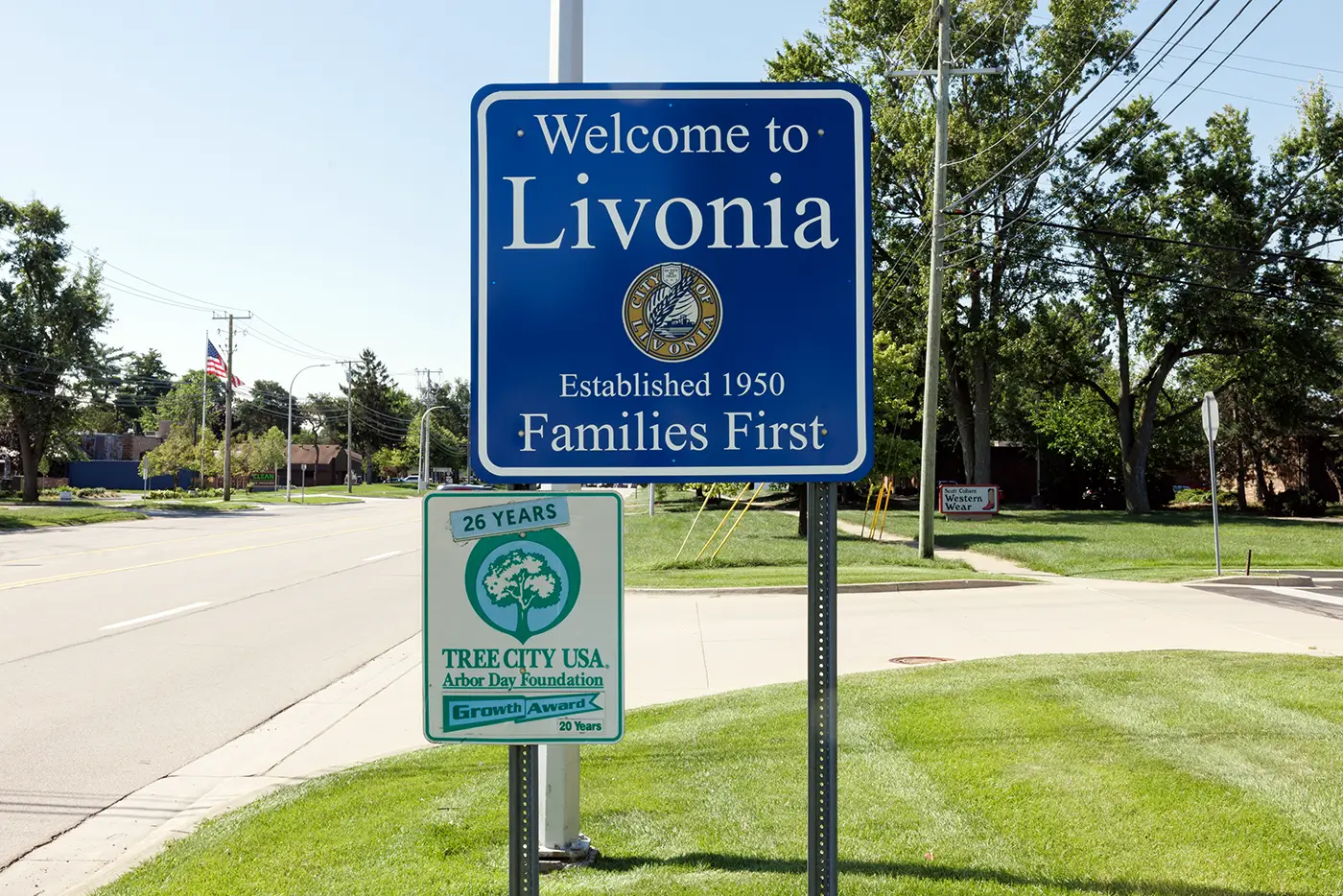 Welcome to Livonia sign along a neighborhood roadway, where Michigan Auto Law represents car accident victims.