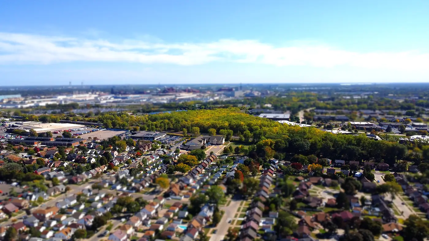 Overhead view of homes and green space in Dearborn representing car accident law firm Michigan Auto Law's service area.