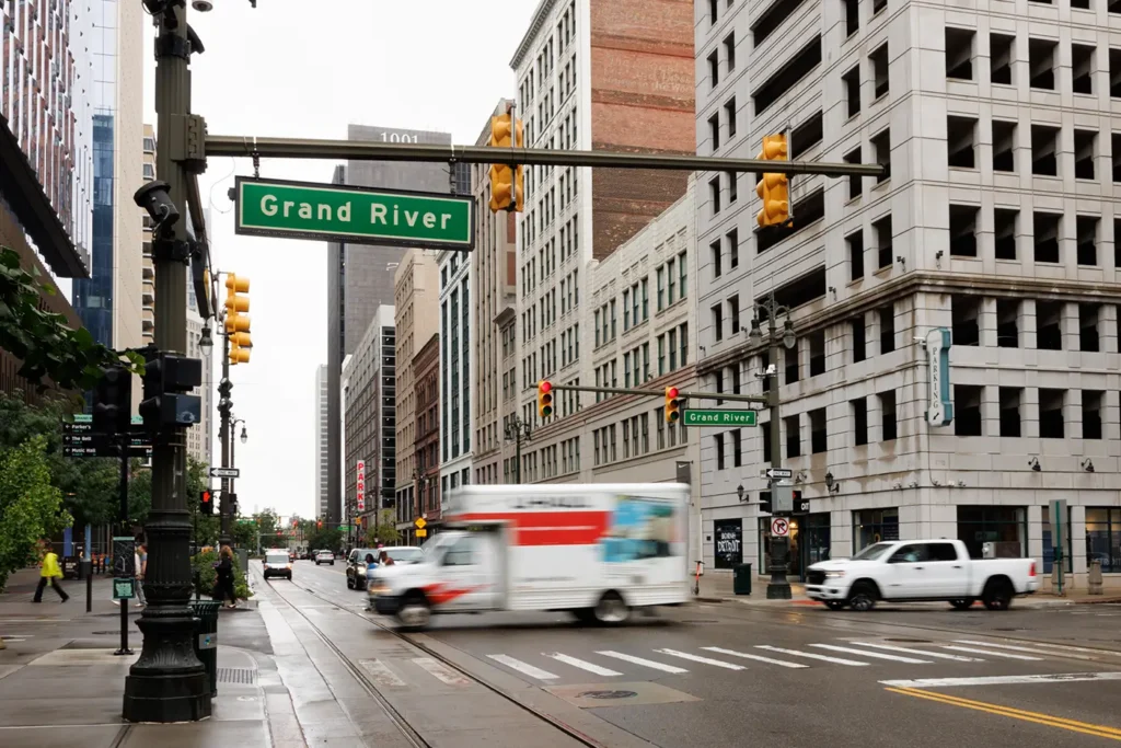 Delivery truck on Grand River Avenue in downtown Detroit, where Michigan Auto Law helps victims as a Detroit truck crash lawyer.