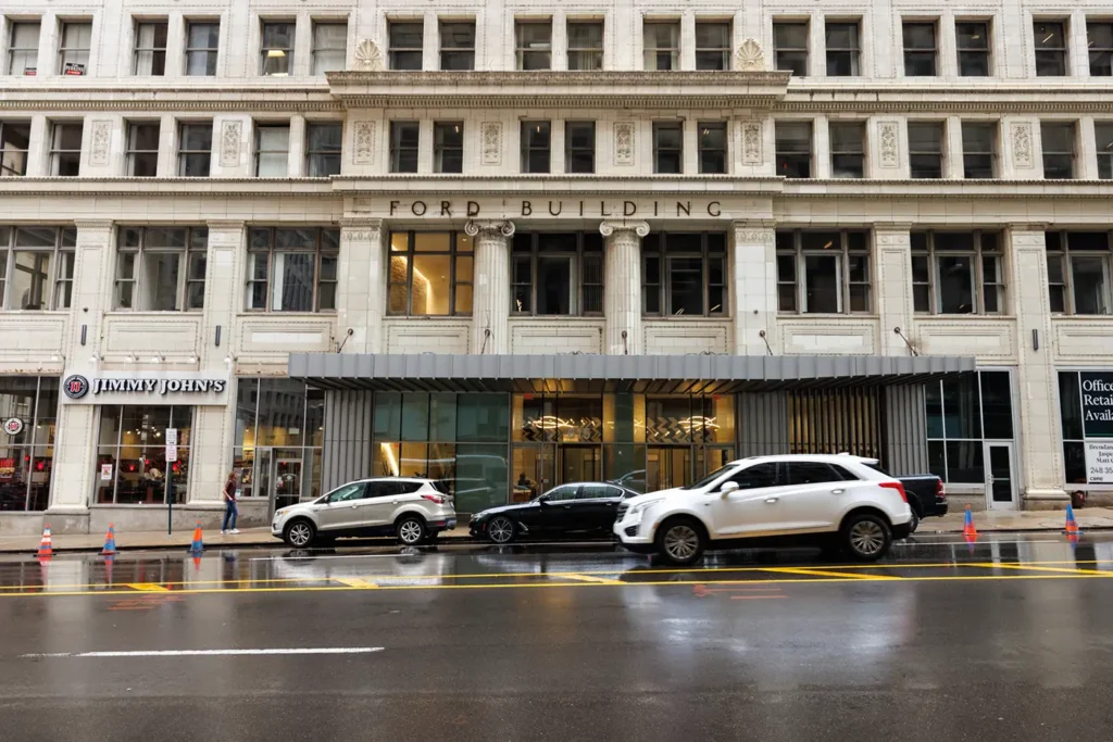 Downtown Detroit street outside the Ford Building, where Michigan Auto Law helps victims as a Lyft accident attorney in Detroit.