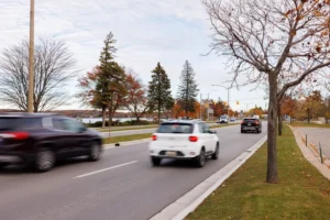  Road by the waterfront, highlighting Michigan Auto Law as a Lyft accident lawyer in Traverse City.