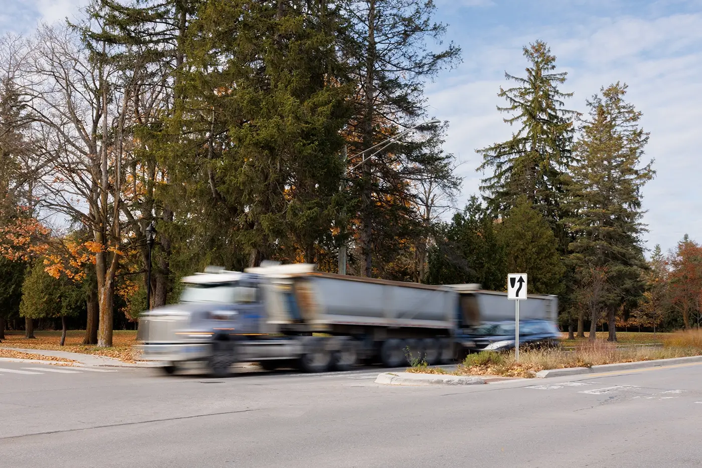 Semi truck on a local Traverse City roadway, where Michigan Auto Law helps after truck accidents.