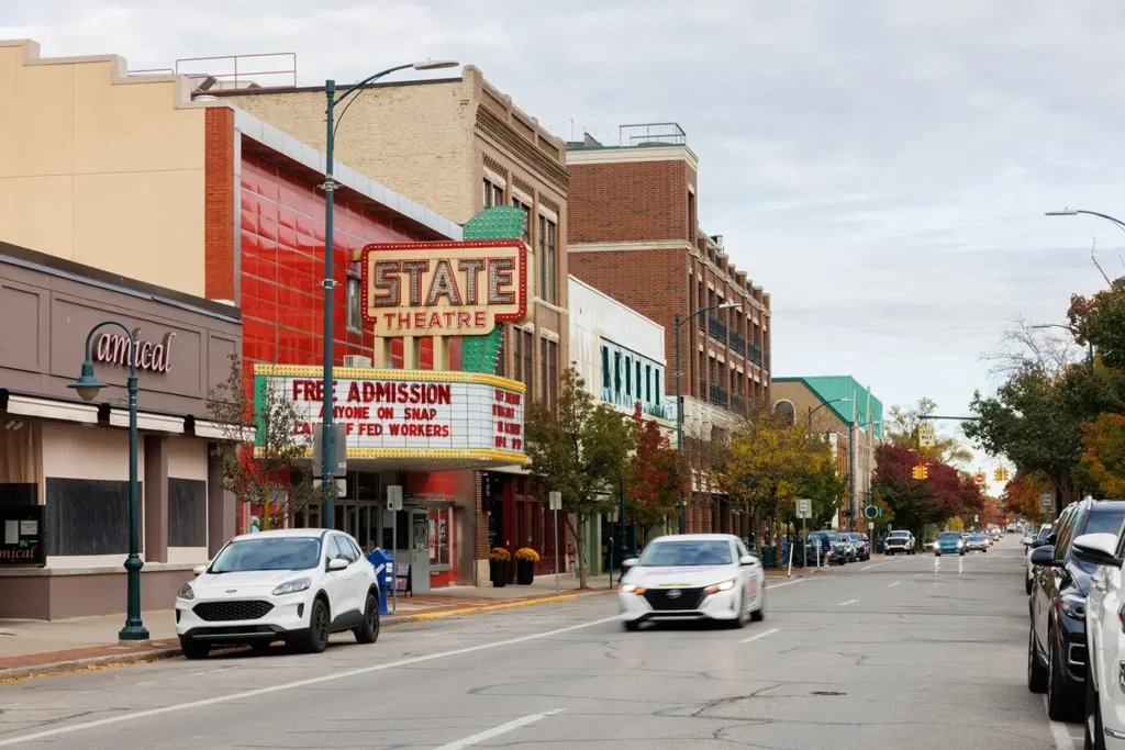 Traffic passes the State Theatre in downtown Traverse City, where Michigan Auto Law helps with Uber-related crashes