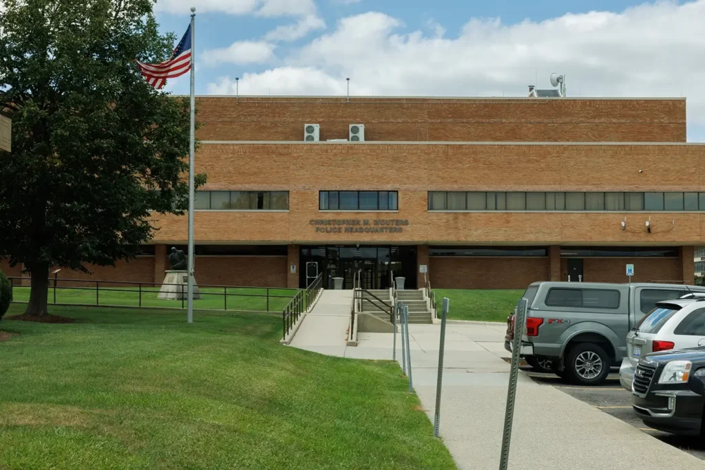 Warren police headquarters exterior, representing the community where Michigan Auto Law helps car accident victims.
