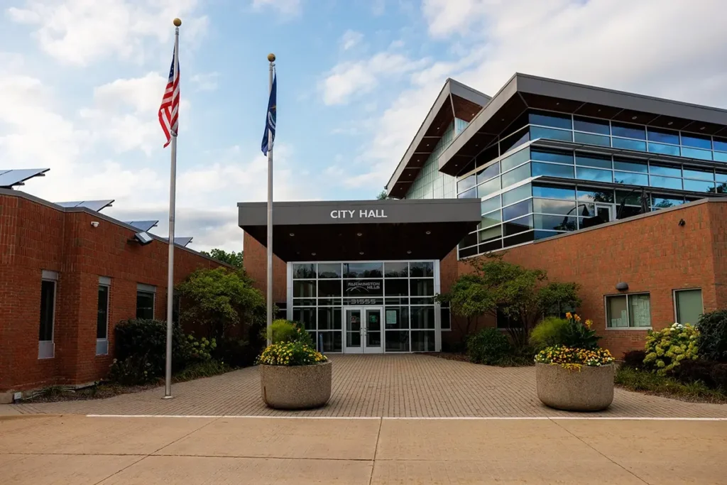 Front entrance to Farmington Hills City Hall, representing the are where Michigan Auto Law provides Lyft crash lawyer services.