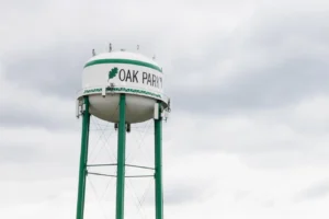Oak Park water tower under a cloudy sky, representing Michigan Auto Law car accident lawyer support.