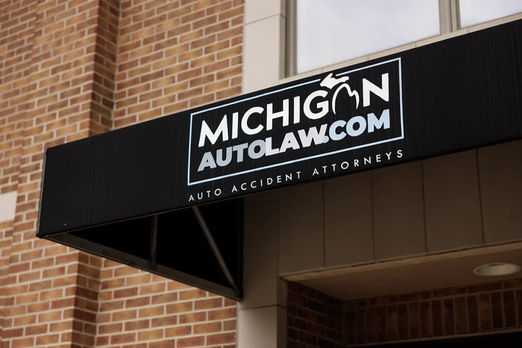 Office entrance sign at Michigan Auto Law, a truck accident attorney in Farmington Hills.
