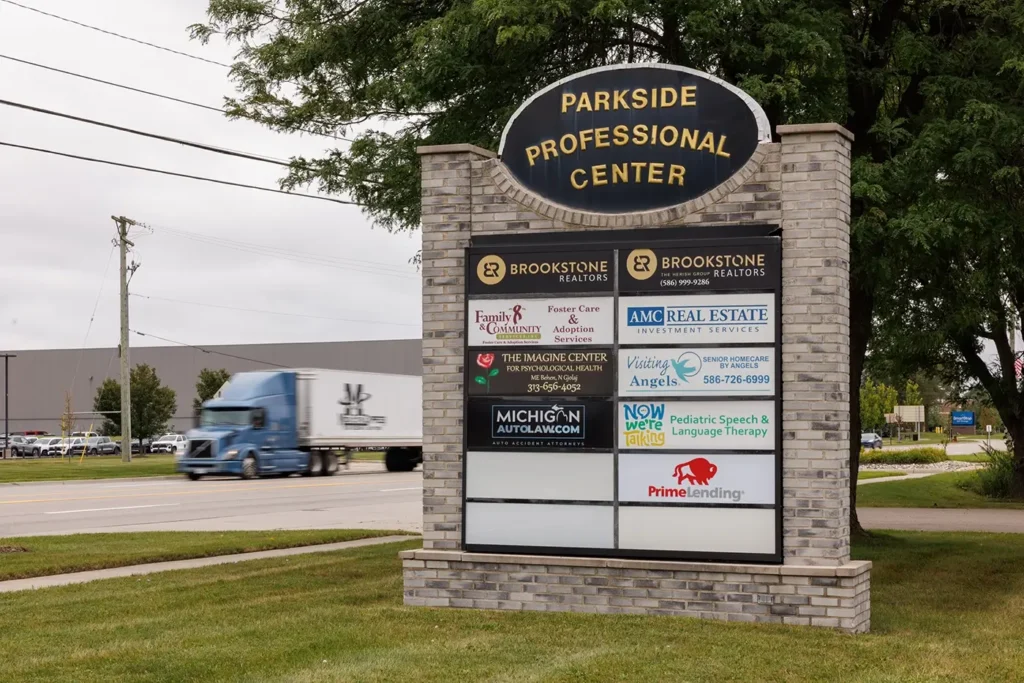 Sterling Heights truck crash lawyers, Michigan Auto Law, shown on the Parkside Professional Center directory sign.