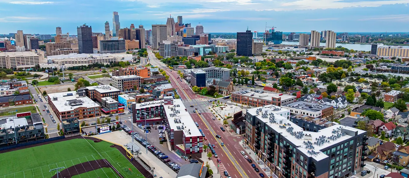 Aerial view of downtown Detroit and surrounding roadways, representing where Michigan Auto Law provides pedestrian accident lawyer services.