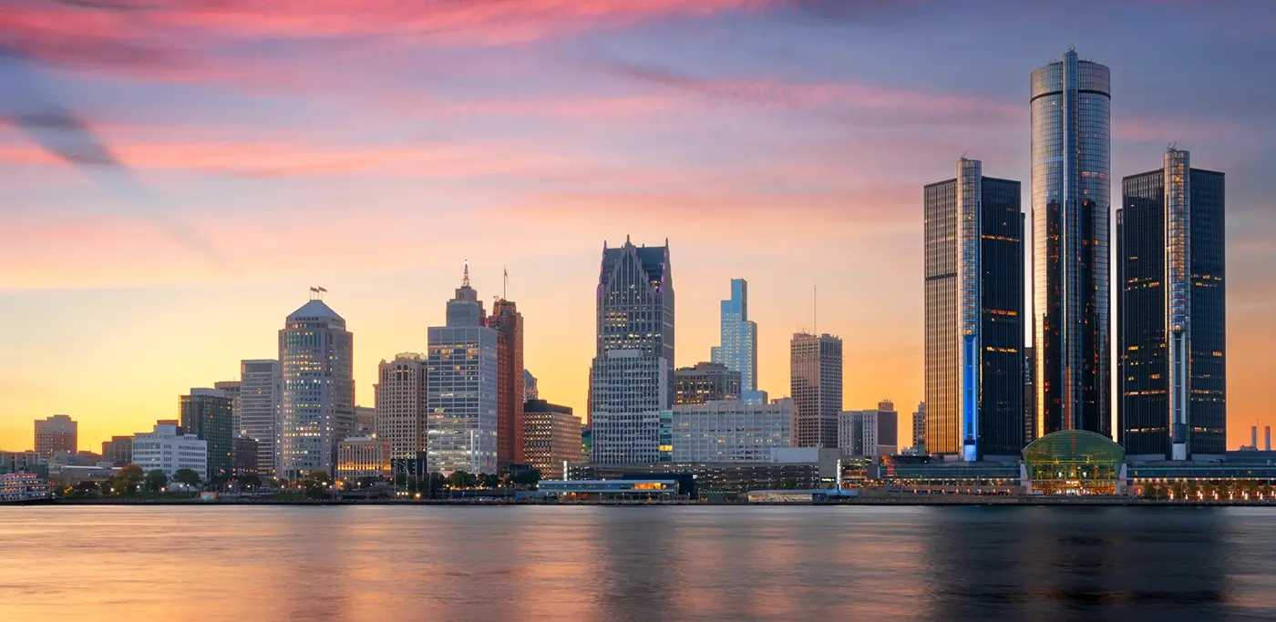 Detroit skyline at sunset, representing the city where Michigan Auto Law provides wrongful death lawyer services.